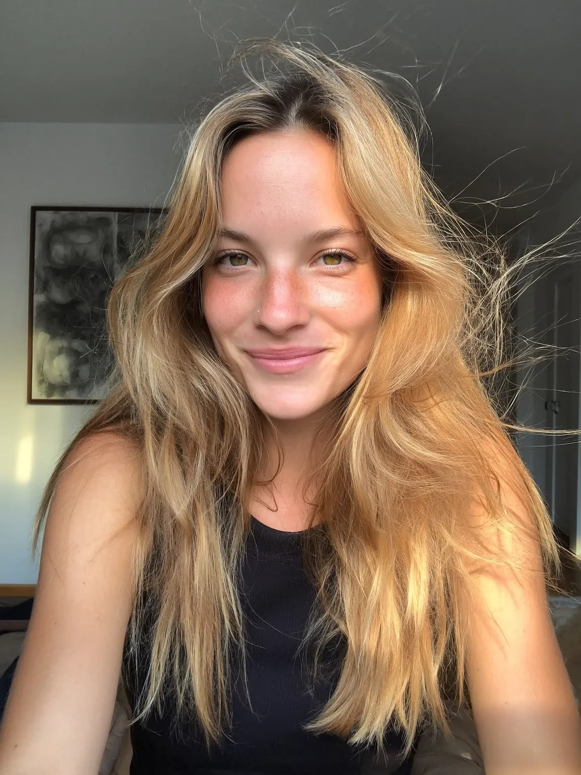 Voluminous Sun-Kissed Sandy Blonde Layers